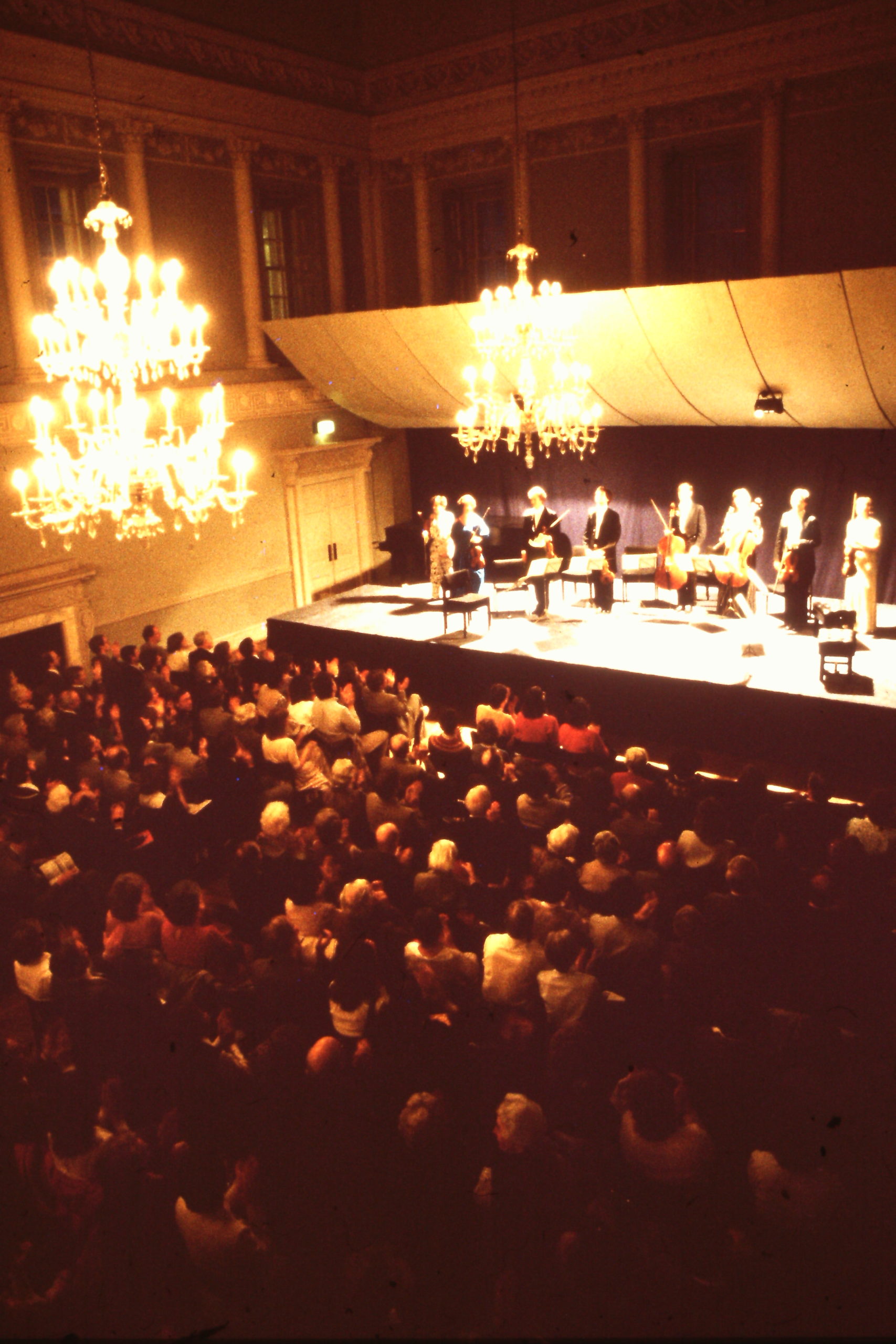 An orchestra performing inside the Assembly Rooms