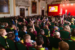 School children at the Guildhall watching Maz Evans' event